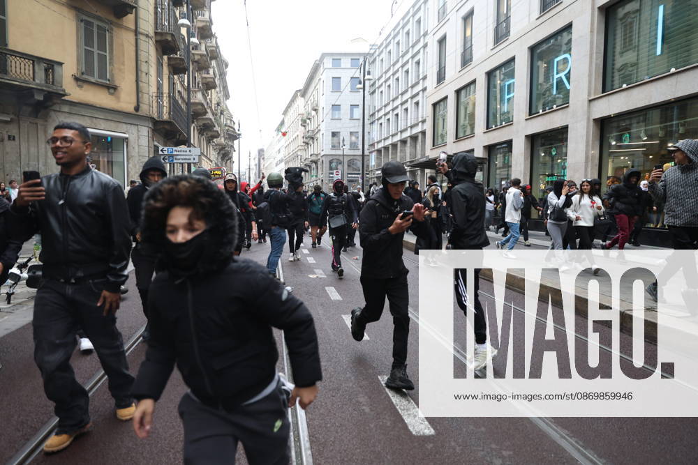 IPA89862232 - Milan: Clashes and looting by hooded youths continued in the city center the day after the demonstration on Saturday, the 17th; many hooded individuals were detained and taken to police headquarters.