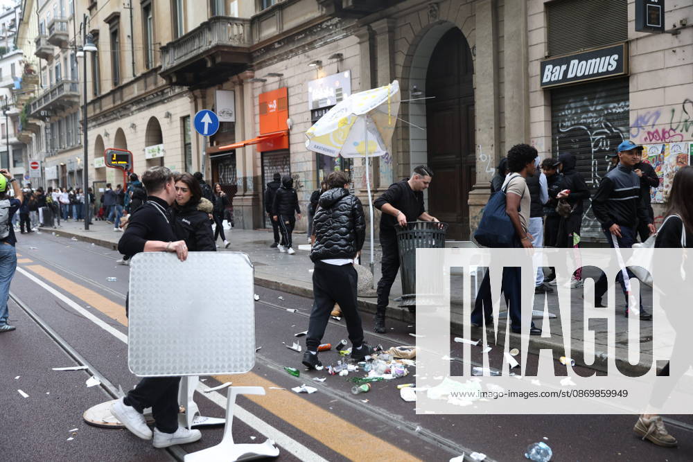 IPA89862310 - Milan: Clashes and looting by hooded youths continued in the city center the day after the demonstration on Saturday, the 17th; many hooded individuals were detained and taken to police headquarters.