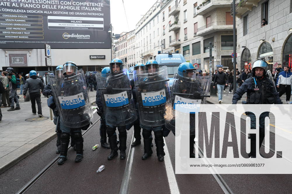 IPA89862696 - Milan: Clashes and looting by hooded youths continued in the city center the day after the demonstration on Saturday, the 17th; many hooded individuals were detained and taken to police headquarters.