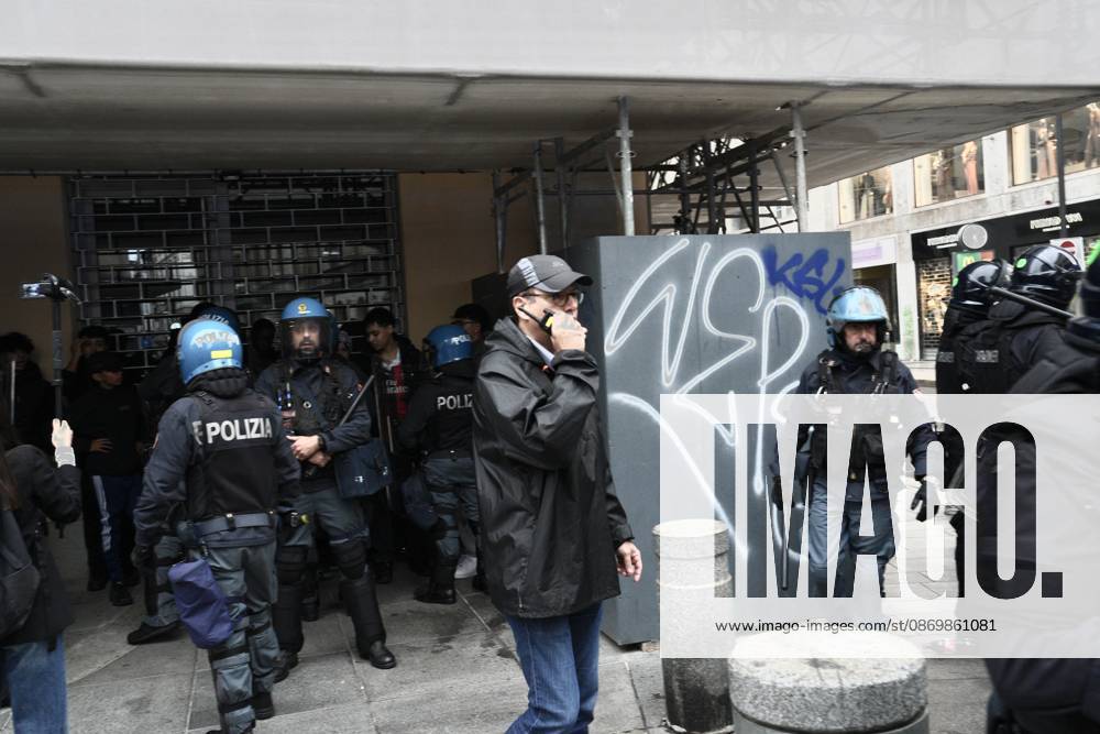 IPA89862779 - Milan: Clashes and looting by hooded youths continued in the city center the day after the demonstration on Saturday, the 17th; many hooded individuals were detained and taken to police headquarters.