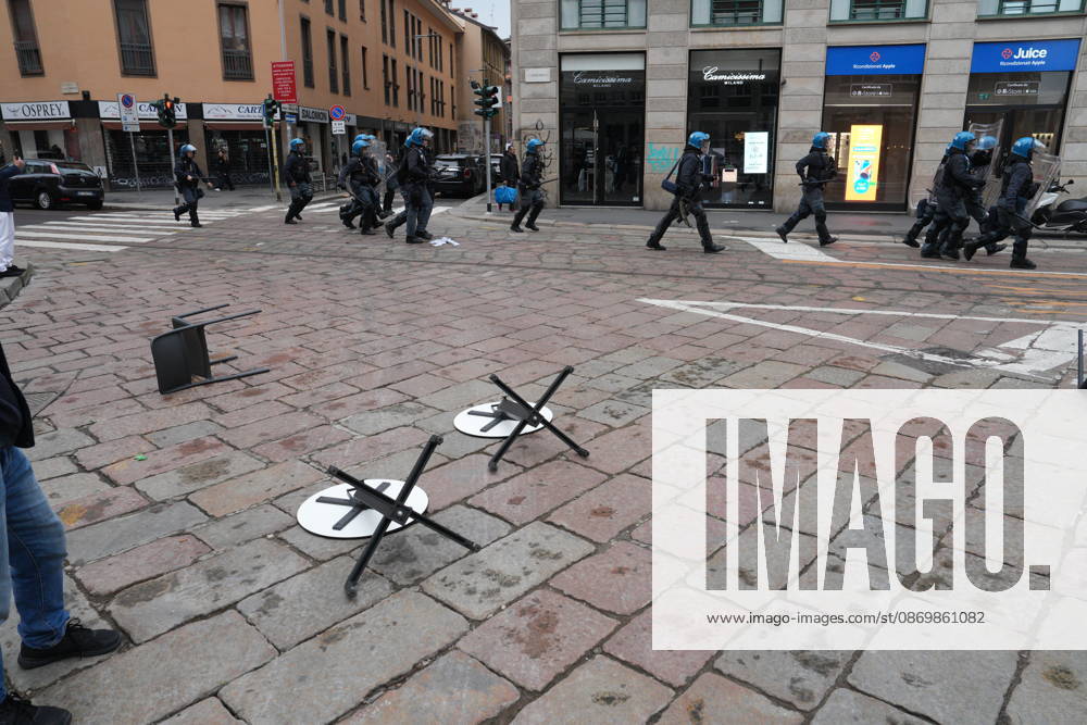 IPA89862845 - Milan: Clashes and looting by hooded youths continued in the city center the day after the demonstration on Saturday, the 17th; many hooded individuals were detained and taken to police headquarters.