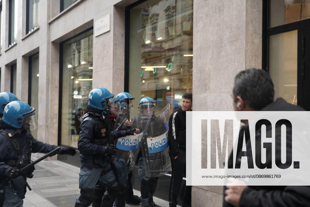 IPA89864108 - Milan: More clashes and looting by hooded youths in the city center the day after the demonstration on Saturday, the 17th; many hooded individuals were detained and taken to police headquarters