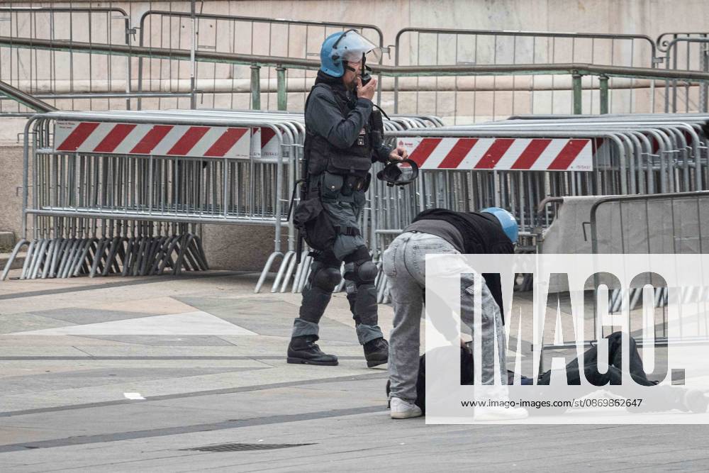 IPA89865112 - Milan: More Clashes and Looting by Hooded Youths in Downtown Milan the Day After the Protest on Saturday, the 17th