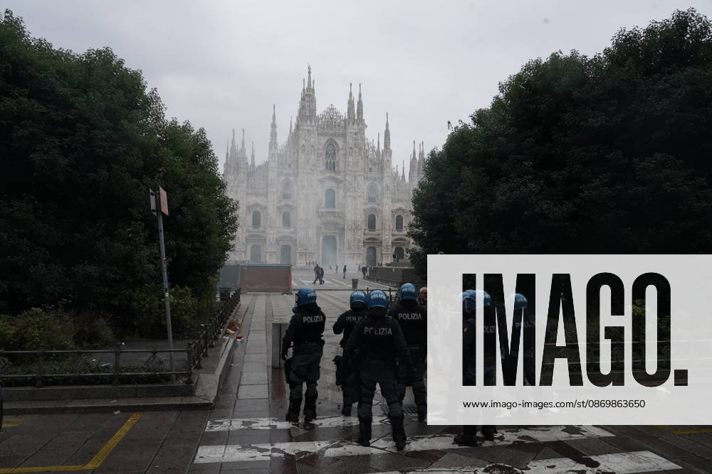 IPA89866383 - Milan: Clashes and looting by hooded youths continued in the city center the day after the demonstration on Saturday, the 17th; many hooded individuals were detained and taken to police headquarters.