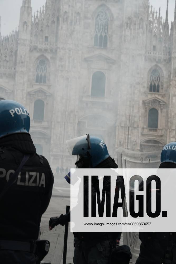 IPA89866388 - Milan: Clashes and looting by hooded youths continued in the city center the day after the demonstration on Saturday, the 17th; many hooded individuals were detained and taken to police headquarters.