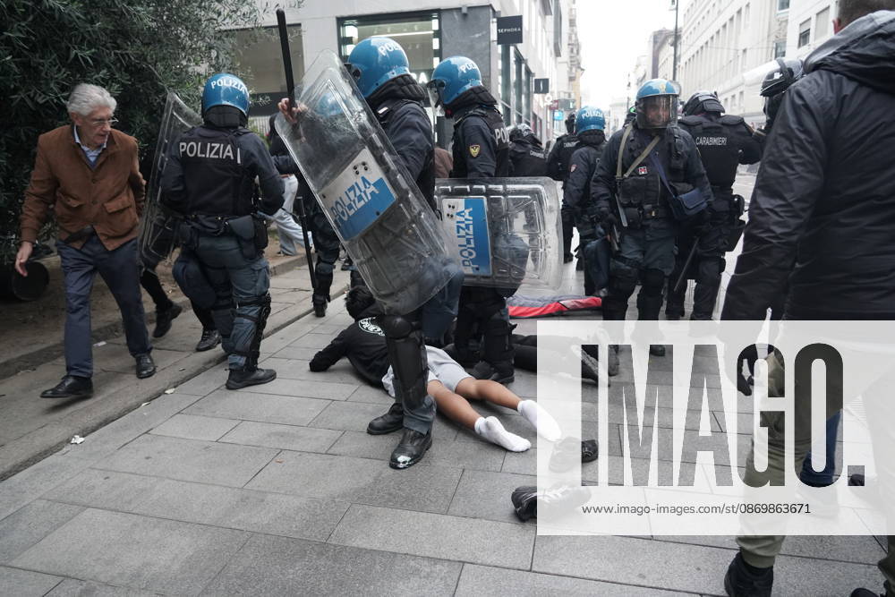 IPA89866417 - Milan: Clashes and looting by hooded youths continued in the city center the day after the demonstration on Saturday, the 17th; many hooded individuals were detained and taken to police headquarters.