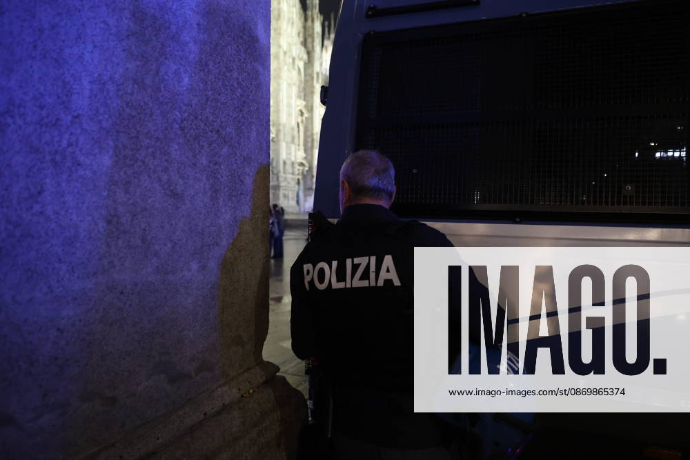 IPA89870090 - Milan: More clashes and looting by hooded youths in the city center the day after the demonstration on Saturday, the 17th; many hooded individuals were detained and taken to police headquarters; windows at La Rinascente were damaged