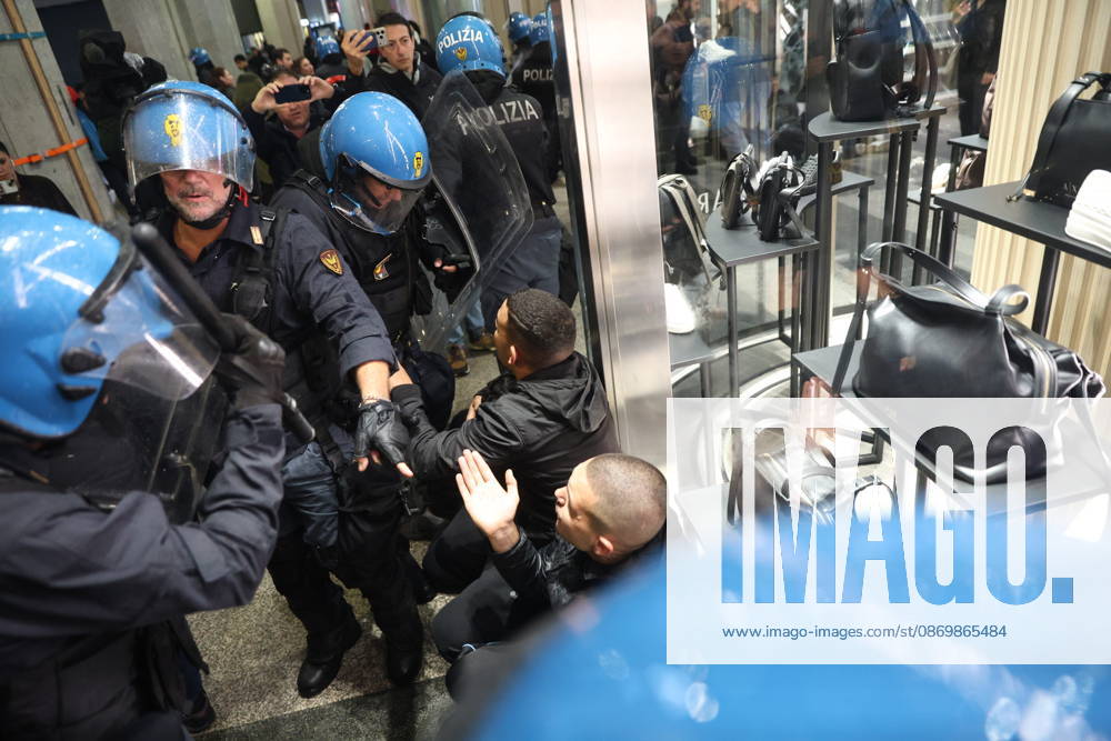 IPA89870075 - Milan: More clashes and looting by hooded youths in the city center the day after the demonstration on Saturday, the 17th; many hooded individuals were detained and taken to police headquarters