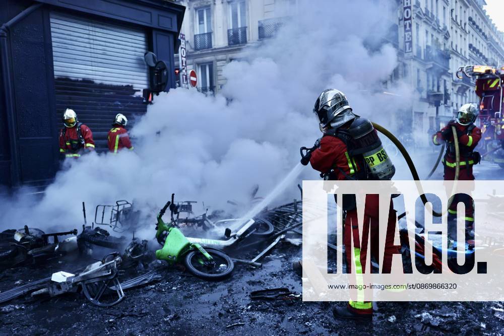 Aftermath of clashes during nationwide protests in Paris PARIS, FRANCE - OCTOBER 18: Firefighters extinguish fires set to bicycles and street debris as streets across Paris show signs of damage following a day of violent clashes between police and protesters amid a nationwide mobilization over rising living costs, fuel prices, and education funding in Paris, France, on October 18, 2026. Ibrahim Ezzat Anadolu Paris France. Editorial use only. Please get in touch for any other usage.