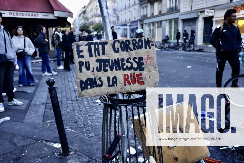 Aftermath of clashes during nationwide protests in Paris PARIS, FRANCE - OCTOBER 18: A view of banners as the firefighters extinguish fires set to bicycles and street debris while streets across Paris show signs of damage following a day of violent clashes between police and protesters amid a nationwide mobilization over rising living costs, fuel prices, and education funding in Paris, France, on October 18, 2026. Ibrahim Ezzat Anadolu Paris France. Editorial use only. Please get in touch for any other usage.