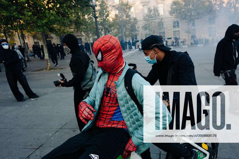 Protesters wearing masks of key pop culture characters, such as Spider-Man here. Protesters gathered at Place de la RÃ publique the day after the demonstration on 17 October; the police used tear gas and water cannons to disperse them. Many found themselves in the surrounding streets. - 18 10 2026 - France Paris Paris - JanxSchmidt-Whitley LexPictorium LePictorium_0344253