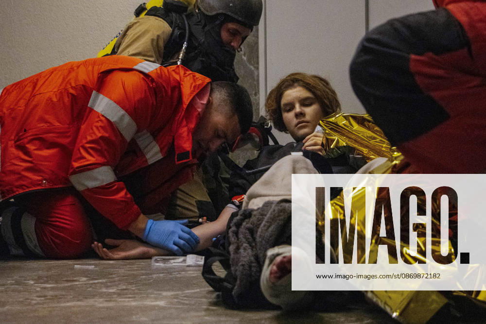 Odesa Ukraine Residential Fire Rescue workers provide medical assistance to an injured person inside a residential building in Odesa, Ukraine on October 18, 2026. Emergency services responded after a fire broke out at the building, prompting a rescue operation and deployment of firefighters to the scene. Odesa Odesa Ukraine