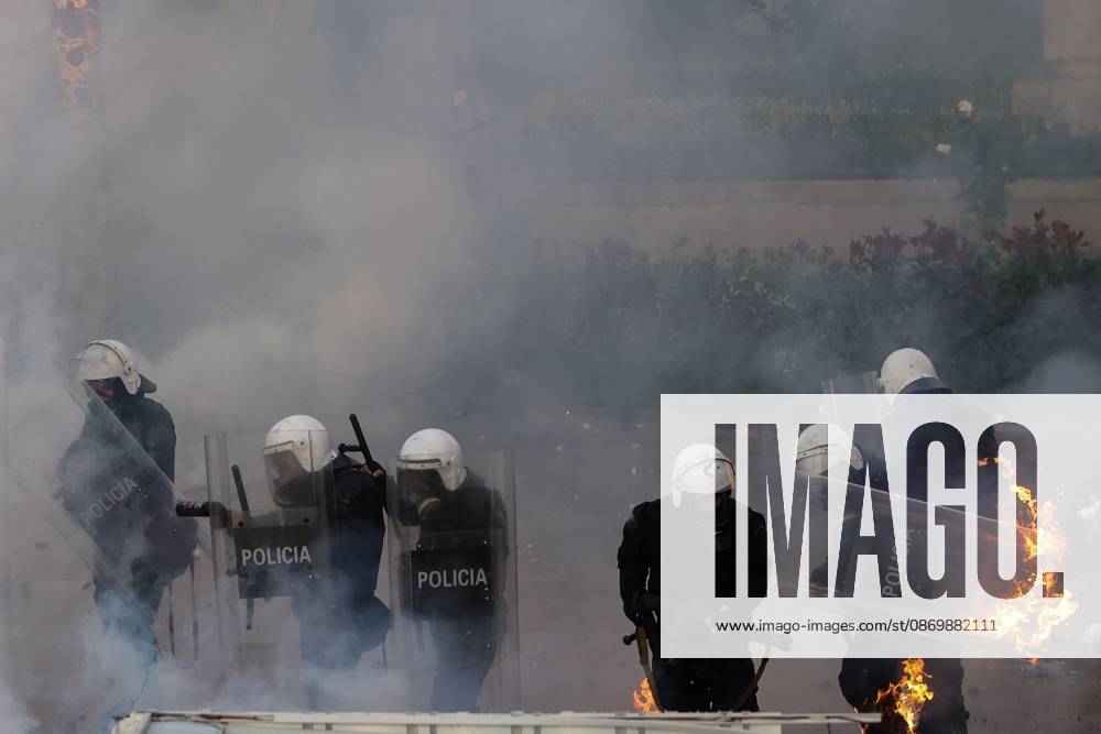 TIRANA, ALBANIA, OCTOBER 18, 2026: Demonstrators clash with riot police in Skanderbeg Square as student-led anti-government protests continue for a sixth consecutive day. Confrontations spread from the Ministry of Education to central Tirana, with protesters throwing stones and pyrotechnics while police deploy tear gas and water cannons. Demonstrators demand improved university conditions and the resignation of Prime Minister Edi Rama. Tirana Albania - ZUMAq101 20261018_zna_q101_223