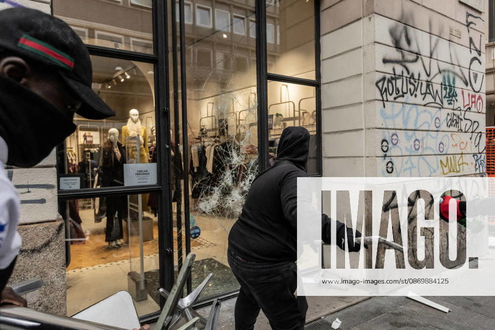 Police detain 160 as unrest continues for second day in Milan MILAN, ITALY - OCTOBER 18: Protesters vandalize a shop during protests in Milan, Italy, on October 18, 2026. Groups threw stones, bottles, firecrackers and barriers at police officers, who responded with tear gas and water cannon, while shops were damaged and looted around the city center and a Carabinieri vehicle was destroyed. Andrea Carrubba Anadolu Milan Italy. Editorial use only. Please get in touch for any other usage.