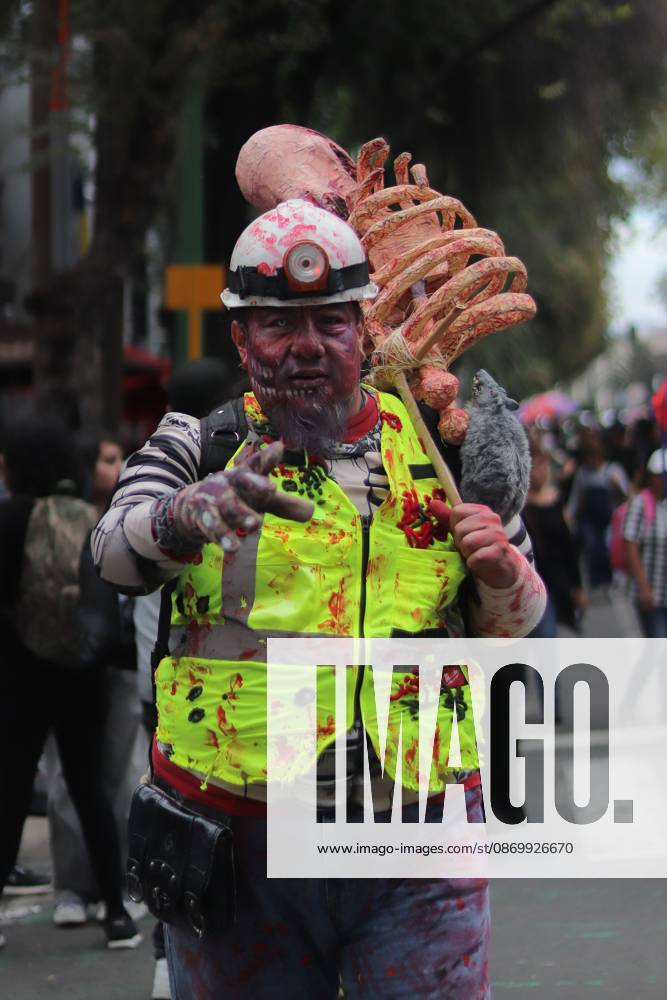 19th annual Zombie Walk Mexico 2026 MEXICO CITY, MEXICO - OCTOBER 18, 2026: Participants in the 19th annual Zombie Walk Mexico 2026, dressed as the living dead, monsters, and horror characters, gather at the Monument to the Revolution in Mexico City. Mexico City Mexico