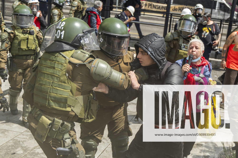 A protester is detained by special police forces during the rally. In the center of the capital of Chile, different incidents took place between demonstrators and the police. The riots were carried out during the commemoration of the 7 years after the social outcast that happened on October 18, 2019. Santiago Chile - ZUMAs197 20261019_aaa_s197_015