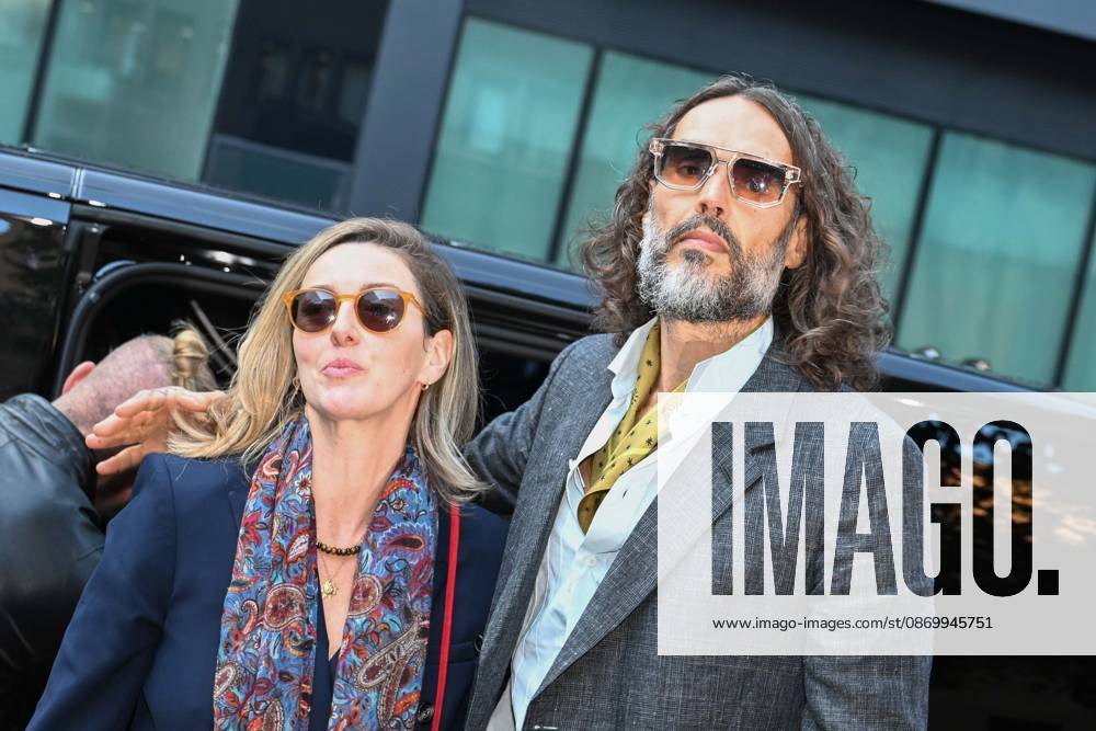 British comedian Russell Brand appears in court in London LONDON, UNITED KINGDOM - OCTOBER 19: British comedian and actor Russell Brand (R) arrives at Southwark Crown Court with his wife Laura Brand (L), in connection with rape and sexual assault charges in London, United Kingdom, on October 19, 2026. Rasid Necati Aslim Anadolu London United Kingdom. Editorial use only. Please get in touch for any other usage.