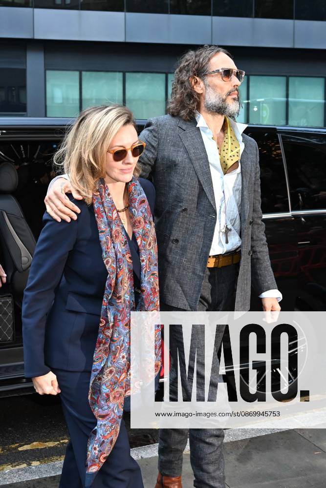 British comedian Russell Brand appears in court in London LONDON, UNITED KINGDOM - OCTOBER 19: British comedian and actor Russell Brand (R) arrives at Southwark Crown Court with his wife Laura Brand (L), in connection with rape and sexual assault charges in London, United Kingdom, on October 19, 2026. Rasid Necati Aslim Anadolu London United Kingdom. Editorial use only. Please get in touch for any other usage.
