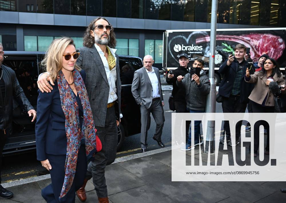 British comedian Russell Brand appears in court in London LONDON, UNITED KINGDOM - OCTOBER 19: British comedian and actor Russell Brand (2nd L) arrives at Southwark Crown Court with his wife Laura Brand (L), in connection with rape and sexual assault charges in London, United Kingdom, on October 19, 2026. Rasid Necati Aslim Anadolu London United Kingdom. Editorial use only. Please get in touch for any other usage.