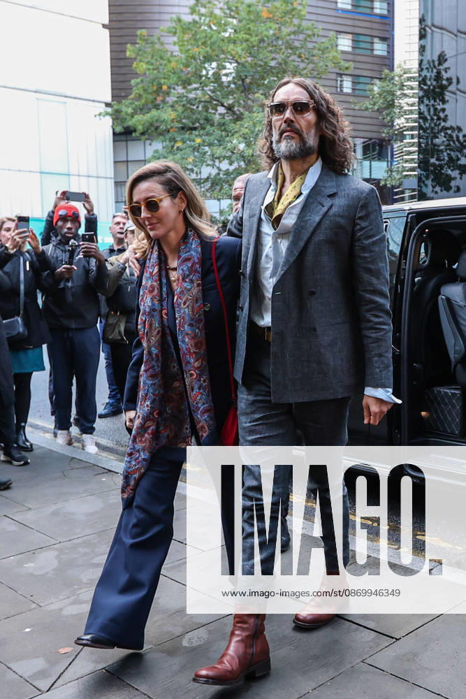 RUSSELL BRAND and his wife, LAURA BRAND, arrive together at Southwark Crown Court in London, on October 19, 2026, for his trial on rape and sexual assault charges, which he denies. London United Kingdom - ZUMAa279 20261019_zsp_a279_005