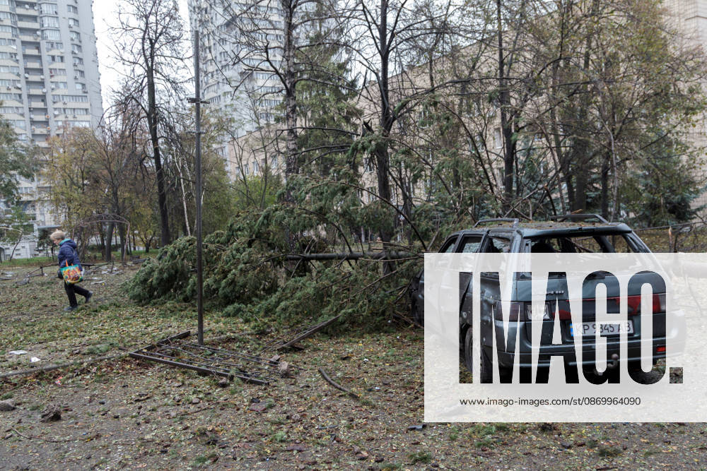 A spruce tree lies on a car in the Solomianskyi district damaged by a Russian attack, Kyiv, Ukraine, October 19, 2026. During the night and morning, Russia launched a massive strike on the capital using ballistic missiles, cruise missiles, and drones. According to Kyiv city head Vitali Klitschko, five people were injured in the Solomianskyi district as a result of the attack. Four residential buildings, a bank office, a private medical clinic, a shopping mall, offices, and vehicles were damaged. (Photo by Kyrylo Chubotin Ukrinform) Russian attack on Kyiv affects shopping mall