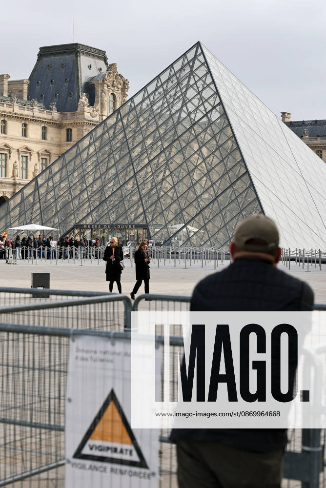 (261019) -- PARIS, Oct. 19, 2026 -- Protesters gather in front of an entrance to the Louvre Museum in Paris, France, Oct. 19, 2026. In Paris, the entrance to the Louvre Museum was blocked by student protesters on Monday morning, French daily Le Parisien reported, citing the museum s management and two trade unions. According to the trade union General Confederation of Labour, the museum would remain closed at least until noon. ) FRANCE-PARIS-LOUVRE MUSEUM-PROTEST WuxHuiwo