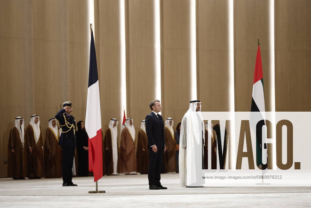 President Macron Visit To Middle East - Abu Dhabi Sheikh Mohamed bin Zayed Al Nahyan, President of the United Arab Emirates (UAE), and French President Emmanuel Macron review troops upon Macron s arrival at Zayed International Airport in Abu Dhabi, United Arab Emirates, October 19, 2026. Photo by Benoit Tessier Pool ABACAPRESS.COM Abu Dhabi United Arab Emirates