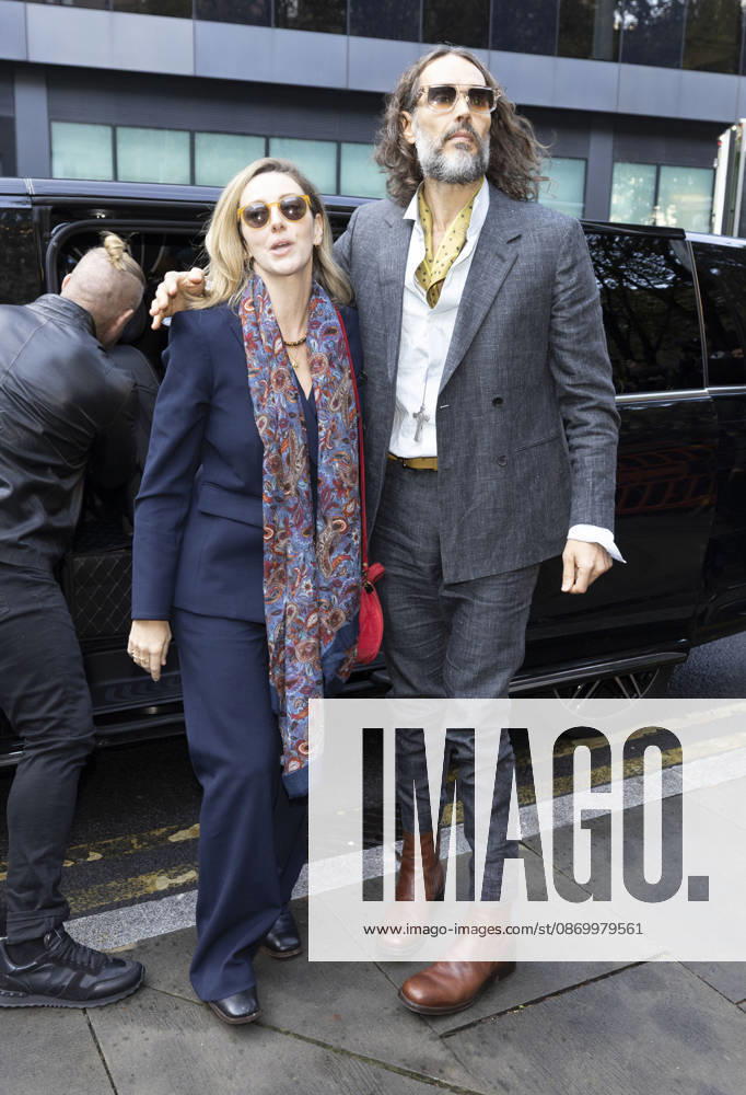 Russell Brand 19.10.2026. Russell Brand and wife Laura arriving at Southwark crown court today