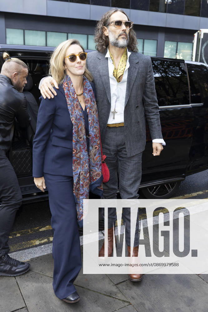 Russell Brand 19.10.2026. Russell Brand and wife Laura arriving at Southwark crown court today
