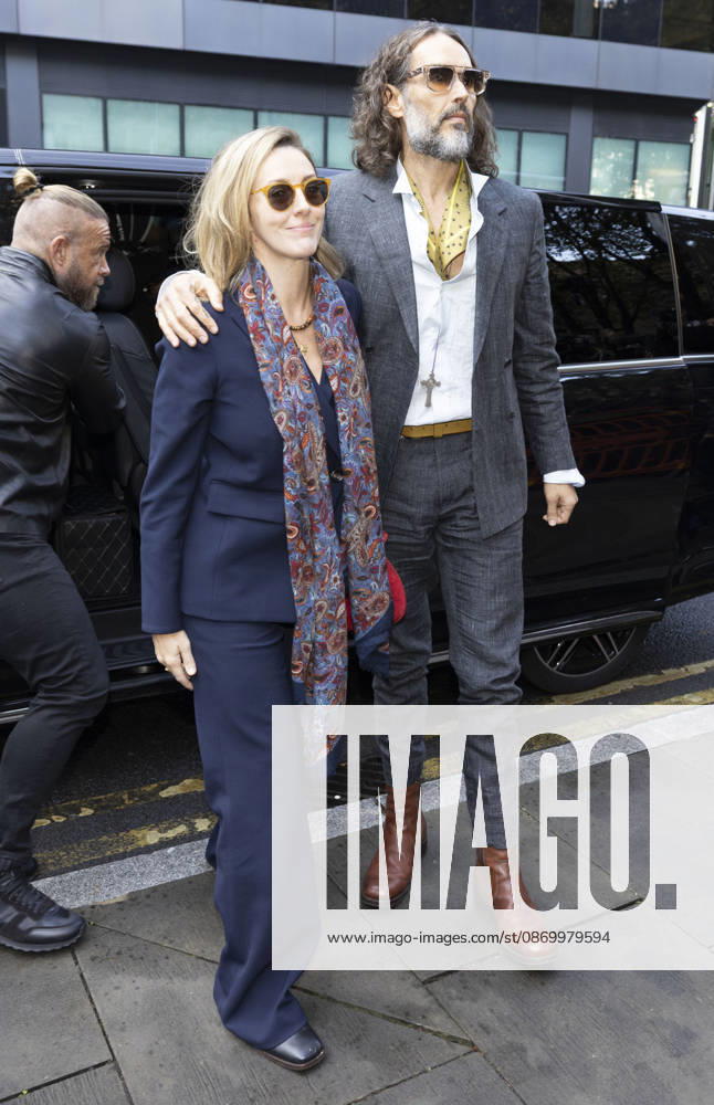 Russell Brand 19.10.2026. Russell Brand and wife Laura arriving at Southwark crown court today