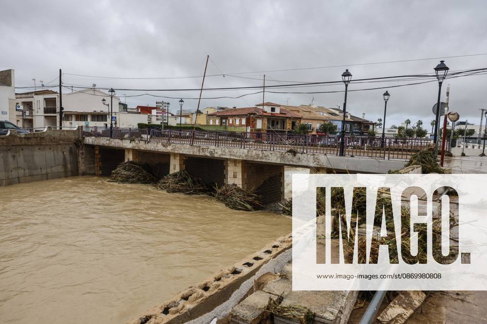 The Valencian Regional Government is preparing a lockdown order for the southern coast of Valencia and the northern coast of Alicante due to the rains. The river is filled with mud and vegetation carried by the rainwater, as of October 19, 2026, in Els Poblets, Valencian Community, Spain. The Valencian Regional Government is preparing a lockdown order for the southern coast of Valencia and the northern coast of Alicante in response to the emergency declared due to the rains caused by Storm Adam, as announced by the Regional Minister of Emergencies and the Interior early this morning, October 19, from the Emergency Coordination Center (CCE) October 19, 2026, Valencia, Valencian Community, Spain