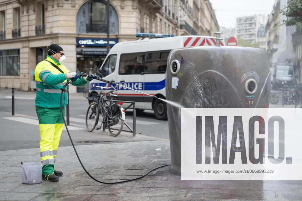 Shops Looted After the October 17th Demonstration - Paris AJ This photo shows a Paris city hall employee cleaning graffiti off a trash can using a high-pressure water jet and cleaning products on October 19, 2026 two days after riots and looting occurred (pillage) on the sidelines of nationwide cost-of-living demonstrations. Photo by Alexis Jumeau ABACAPRESS.COM Paris France