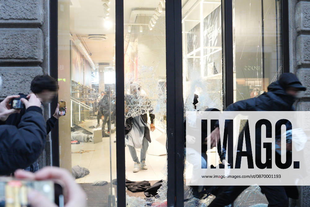 IPA89923814 - Milan, October 18, 2026: More Clashes and Looting in Downtown Milan in the Wake of the Protest; Store Stormed and Ransacked