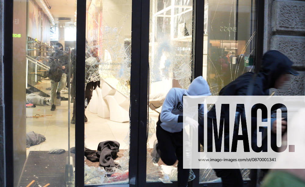 IPA89923818 - Milan, October 18, 2026: More Clashes and Looting in Downtown Milan in the Wake of the Protest; Store Stormed and Ransacked