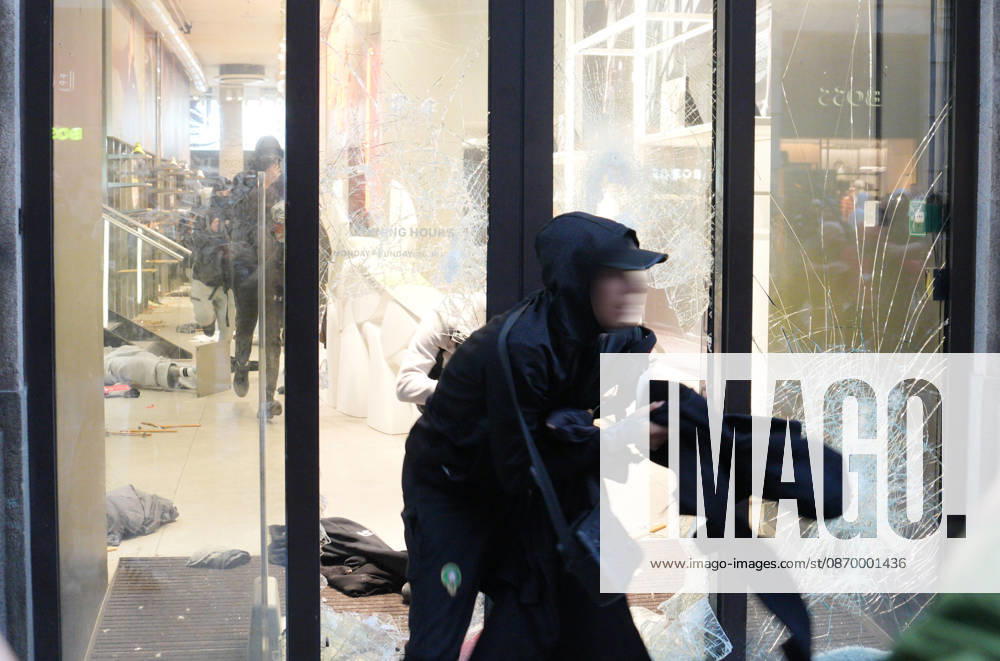 IPA89923838 - Milan, October 18, 2026: More Clashes and Looting in Downtown Milan in the Wake of the Protest; Store Stormed and Ransacked
