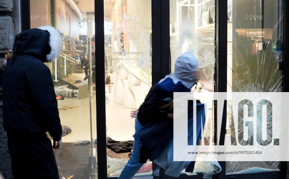 IPA89923843 - Milan, October 18, 2026: More Clashes and Looting in Downtown Milan in the Wake of the Protest; Store Stormed and Ransacked