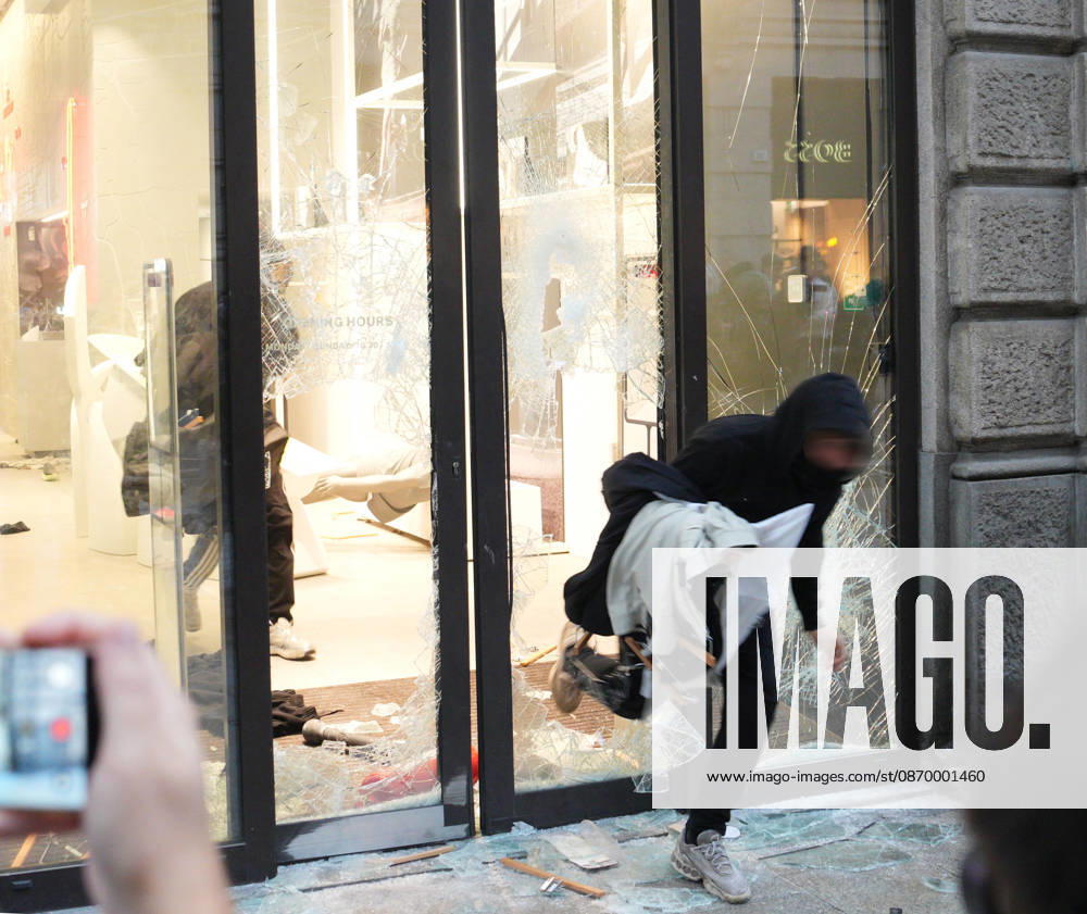 IPA89923845 - Milan, October 18, 2026: More Clashes and Looting in Downtown Milan in the Wake of the Protest; Store Stormed and Ransacked