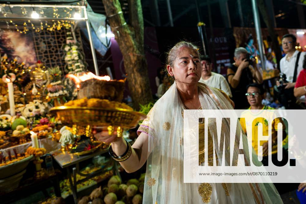 Navaratri 2026 Celebrations Highlight Bangkoks Hindu Heritage BANGKOK, THAILAND - OCTOBER 20, 2026: marked Navaratri 2026 with religious ceremonies and traditional worship at Sri Maha Mariamman Temple, commonly known as Wat Khaek, on Silom Road. Held from October 10 to 22, the annual festival brought Hindu devotees together to honour Goddess Durga and celebrate the triumph of good over evil. The programme included daily prayers, offerings and sacred rituals, reflecting the religious significance of Navaratri within Thailands Hindu community. The main event took place on October 20, when the annual Vijaya Dasami procession departed from the temple at 7:30 p.m. The procession commemorated Goddess Durgas victory over the demon Mahish
