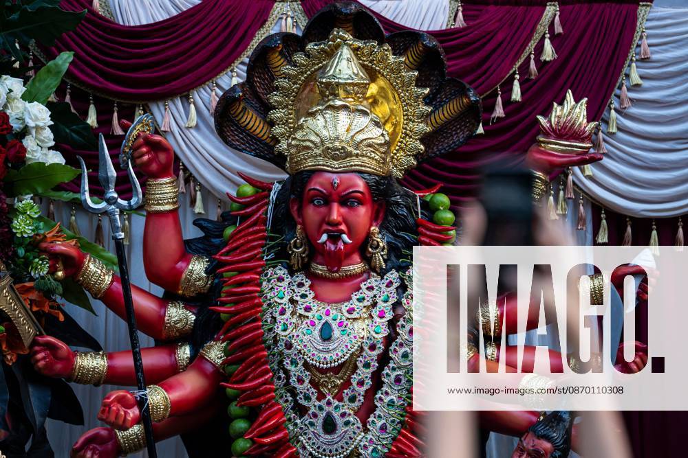 Navaratri 2026 Celebrations Highlight Bangkoks Hindu Heritage BANGKOK, THAILAND - OCTOBER 20, 2026: marked Navaratri 2026 with religious ceremonies and traditional worship at Sri Maha Mariamman Temple, commonly known as Wat Khaek, on Silom Road. Held from October 10 to 22, the annual festival brought Hindu devotees together to honour Goddess Durga and celebrate the triumph of good over evil. The programme included daily prayers, offerings and sacred rituals, reflecting the religious significance of Navaratri within Thailands Hindu community. The main event took place on October 20, when the annual Vijaya Dasami procession departed from the temple at 7:30 p.m. The procession commemorated Goddess Durgas victory over the demon Mahish