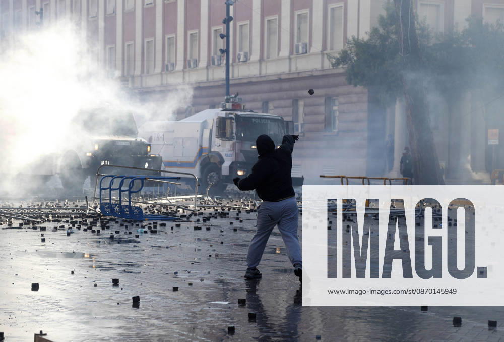 Protesters Clash with Police During a Demonstration in Tirana, Albania. Protesters throw stones towards Albanian Police officers during during an anti-government demonstration in central Tirana on October 17, 2026, as protests continued for a fifth consecutive day over university conditions and demands for the resignation of Albanian Prime Minister Edi Rama. The latest rally follows four nights of violence in the capital, during which protesters and riot police clashed, police used water cannons and tear gas, and demonstrators damaged government offices and shops and set fire to several buildings. Light Studio Agency Malton Dibra Tirana Albania