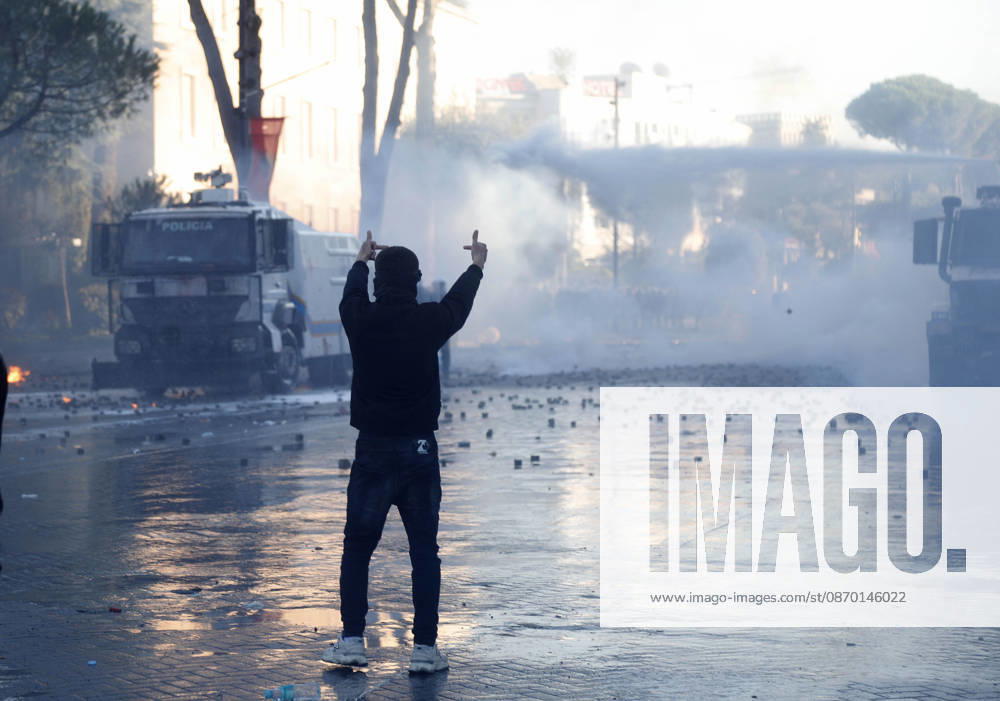 Protesters Clash with Police During a Demonstration in Tirana, Albania. Protesters throw molotov cocktails towards Albanian Police officers during during an anti-government demonstration in central Tirana on October 17, 2026, as protests continued for a fifth consecutive day over university conditions and demands for the resignation of Albanian Prime Minister Edi Rama. The latest rally follows four nights of violence in the capital, during which protesters and riot police clashed, police used water cannons and tear gas, and demonstrators damaged government offices and shops and set fire to several buildings. Light Studio Agency Malton Dibra Tirana Albania