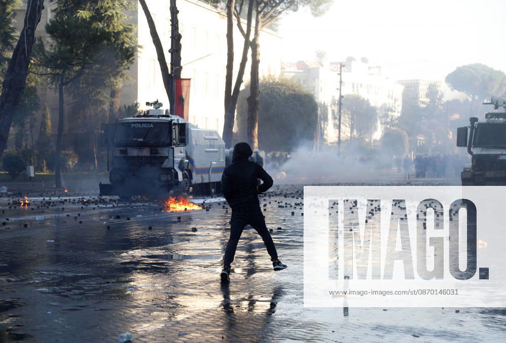 Protesters Clash with Police During a Demonstration in Tirana, Albania. Protesters throw molotov cocktails towards Albanian Police officers during during an anti-government demonstration in central Tirana on October 17, 2026, as protests continued for a fifth consecutive day over university conditions and demands for the resignation of Albanian Prime Minister Edi Rama. The latest rally follows four nights of violence in the capital, during which protesters and riot police clashed, police used water cannons and tear gas, and demonstrators damaged government offices and shops and set fire to several buildings. Light Studio Agency Malton Dibra Tirana Albania