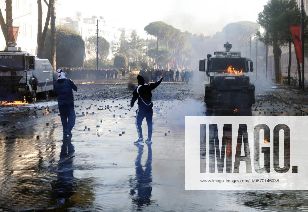 Protesters Clash with Police During a Demonstration in Tirana, Albania. Protesters throw molotov cocktails towards Albanian Police officers during during an anti-government demonstration in central Tirana on October 17, 2026, as protests continued for a fifth consecutive day over university conditions and demands for the resignation of Albanian Prime Minister Edi Rama. The latest rally follows four nights of violence in the capital, during which protesters and riot police clashed, police used water cannons and tear gas, and demonstrators damaged government offices and shops and set fire to several buildings. Light Studio Agency Malton Dibra Tirana Albania