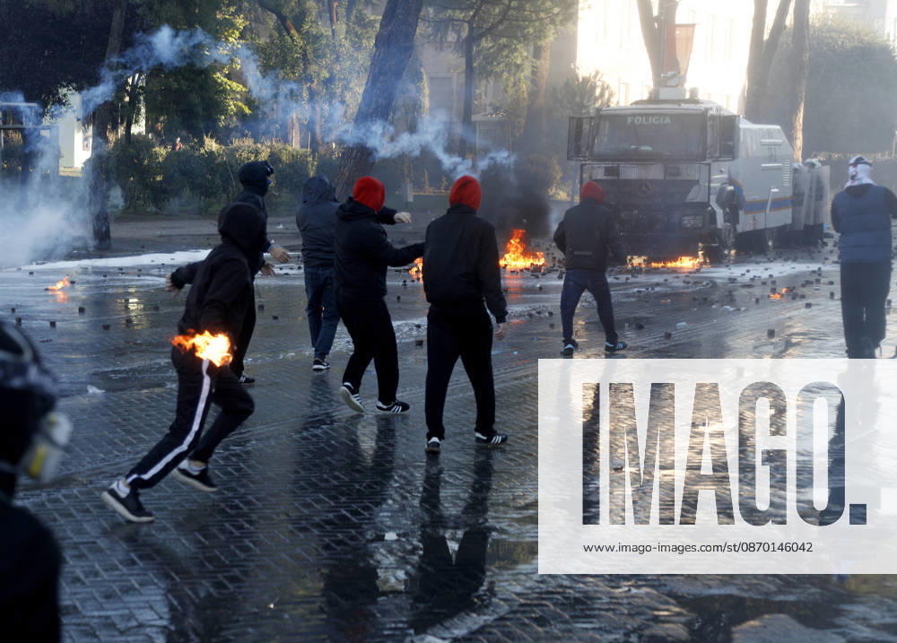 Protesters Clash with Police During a Demonstration in Tirana, Albania. Protesters throw molotov cocktails towards Albanian Police officers during during an anti-government demonstration in central Tirana on October 17, 2026, as protests continued for a fifth consecutive day over university conditions and demands for the resignation of Albanian Prime Minister Edi Rama. The latest rally follows four nights of violence in the capital, during which protesters and riot police clashed, police used water cannons and tear gas, and demonstrators damaged government offices and shops and set fire to several buildings. Light Studio Agency Malton Dibra Tirana Albania