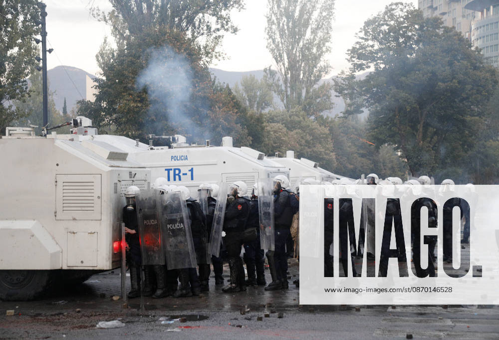Protesters Clash with Police During a Demonstration in Tirana, Albania. Protesters clash with riot police during an anti-government demonstration in central Tirana on October 17, 2026, as protests continued for a fifth consecutive day over university conditions and demands for the resignation of Albanian Prime Minister Edi Rama. The latest rally follows four nights of violence in the capital, during which protesters and riot police clashed, police used water cannons and tear gas, and demonstrators damaged government offices and shops and set fire to several buildings. Light Studio Agency Malton Dibra Tirana Albania
