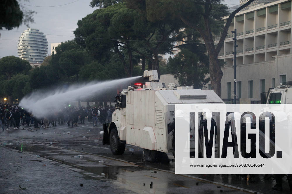 Protesters Clash with Police During a Demonstration in Tirana, Albania. Protesters throw stones towards Albanian Police officers during during an anti-government demonstration in central Tirana on October 17, 2026, as protests continued for a fifth consecutive day over university conditions and demands for the resignation of Albanian Prime Minister Edi Rama. The latest rally follows four nights of violence in the capital, during which protesters and riot police clashed, police used water cannons and tear gas, and demonstrators damaged government offices and shops and set fire to several buildings. Light Studio Agency Malton Dibra Tirana Albania