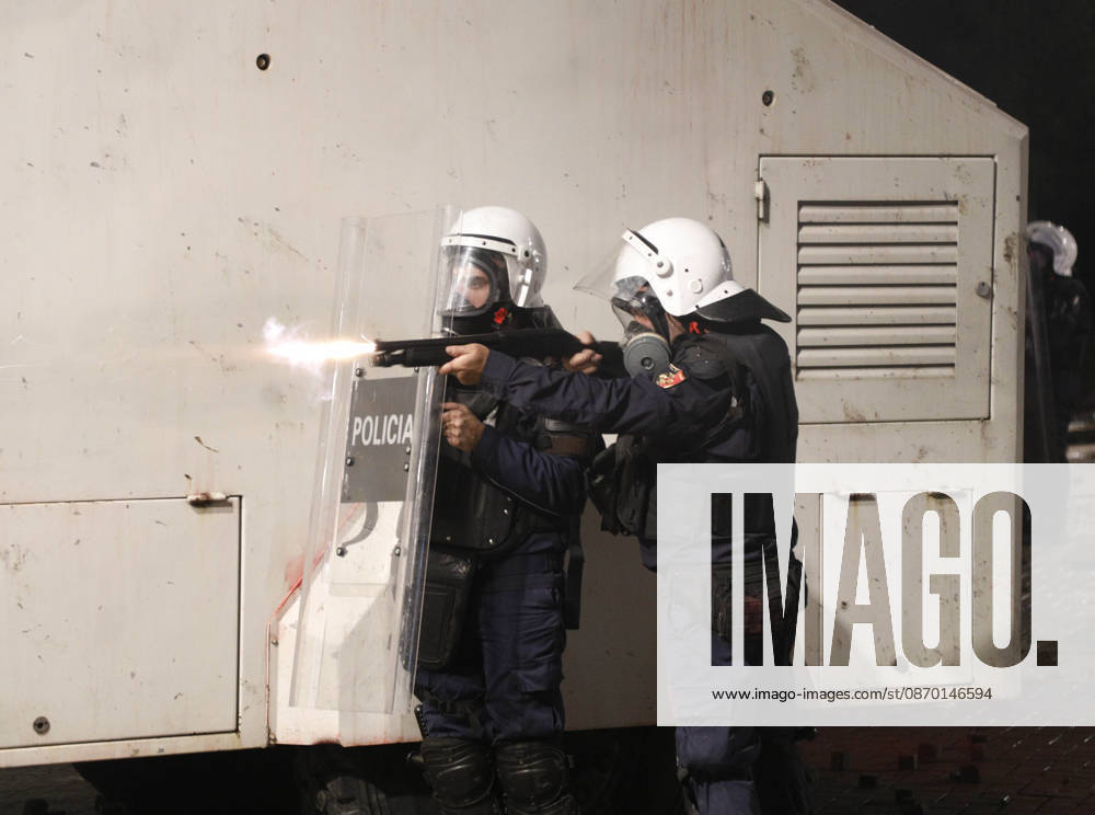 Protesters Clash with Police During a Demonstration in Tirana, Albania. A riot police officer fires rubber bullets towards protesters during an anti-government demonstration in central Tirana on October 17, 2026, as protests continued for a fifth consecutive day over university conditions and demands for the resignation of Albanian Prime Minister Edi Rama. The latest rally follows four nights of violence in the capital, during which protesters and riot police clashed, police used water cannons and tear gas, and demonstrators damaged government offices and shops and set fire to several buildings. Light Studio Agency Malton Dibra Tirana Albania