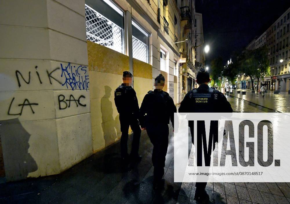 Lyon Curfew PHOTOPQR LE PROGRES Stéphane GUIOCHON Lyon 2nd District October 20, 2026 Lyon Curfew In the streets of Lyon, from Place Carnot through Place Bellecour and Rue de la République, Place des Jacobins, and Place de la République, law enforcement officers are patrolling to enforce the curfew in Lyon following the riots of October 17, 2026, in Lyon’s 2nd Arrondissement, October 20, 2026 – Curfew in Lyon Law enforcement officers are patrolling the streets of Lyon—covering the area from Place Carnot, through Place Bellecour, Rue de la République, and Place des Jacobins to Place de la République—to enforce a curfew following the riots of October 17, 2026. Lyon 2nd Arrondissement, Rhône, Rhône-Alpes, France