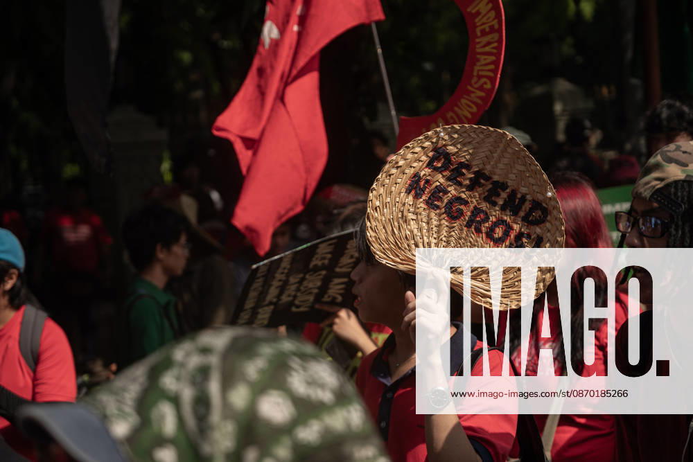 Hundreds of youth activists, rights advocates, and agrarian reform advocates marched with farmers, indigenous people, and workers as they celebrate Peasants Day. Quezon City Philippines - ZUMAy102 20261021_zip_y102_009