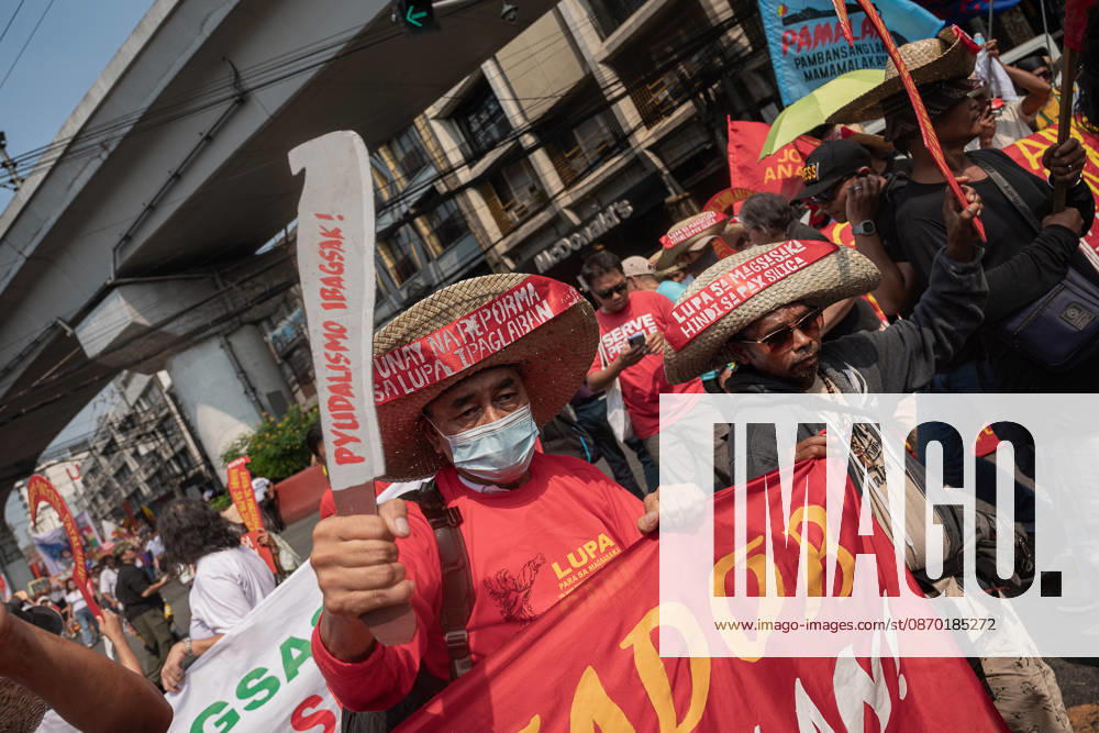 Hundreds of youth activists, rights advocates, and agrarian reform advocates marched with farmers, indigenous people, and workers as they celebrate Peasants Day. Quezon City Philippines - ZUMAy102 20261021_zip_y102_012